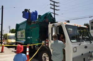 Fun for Adults and Children.  With the help of trained city staff, visitors to the Santa Monica Festival learn how to operate the side loader truck.  The Birthday Party Truck is available to rent at parties and other events in Santa Monica