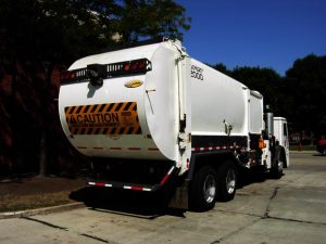 Refuse truck with Alcoa Wheels