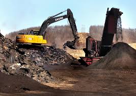 Asphalt shingles are separated from other materials at the landfill. The clean shingles are processed for use by local contractors and the County Highway Department for use in road construction and other projects.