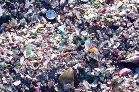 If available, crushed glass transmits water well and makes a very good bedding material.
